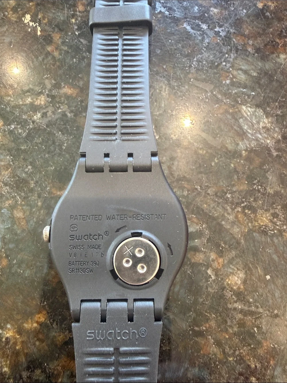 Swatch Black Silicone Strap Watch with Blackish/Grey dial.